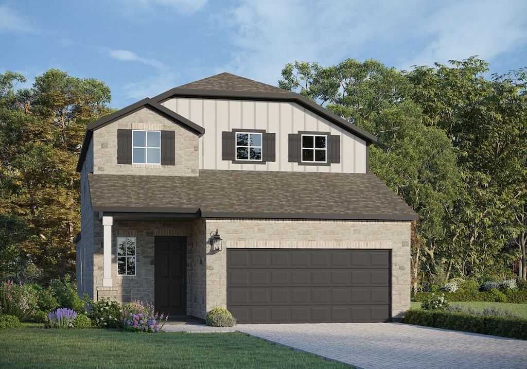 2360 Sawdust Dr, Georgetown, TX 78633 - view of front of property with roof with shingles, board and batten siding, stone siding, and driveway