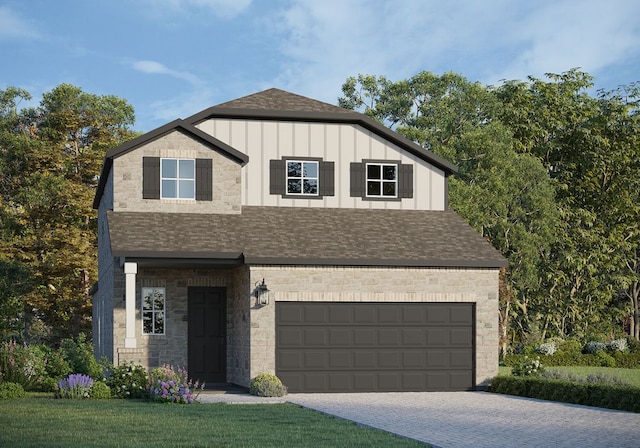 2360 Sawdust Dr, Georgetown, TX 78633 - view of front of property with roof with shingles, board and batten siding, stone siding, and driveway