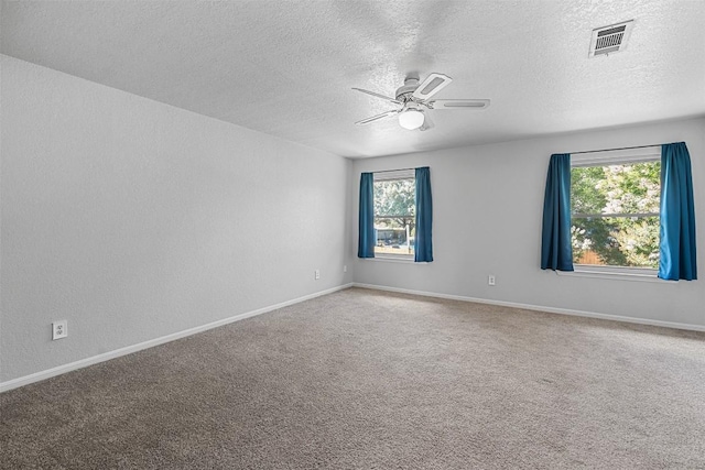 506 Turtle Back Cv, Killeen, TX 76542 - carpeted empty room featuring ceiling fan, a textured ceiling, and healthy amount of natural light