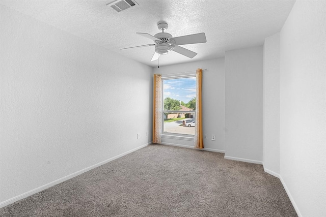 506 Turtle Back Cv, Killeen, TX 76542 - spare room featuring ceiling fan, a textured ceiling, and carpet floors