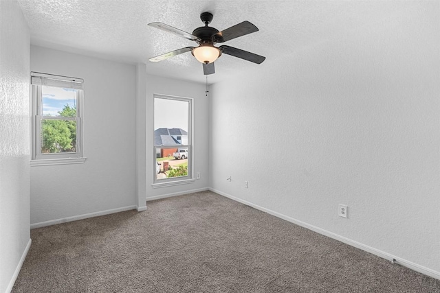506 Turtle Back Cv, Killeen, TX 76542 - carpeted spare room with a textured ceiling and ceiling fan