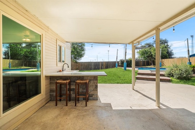 506 Turtle Back Cv, Killeen, TX 76542 - fenced backyard featuring a patio area
