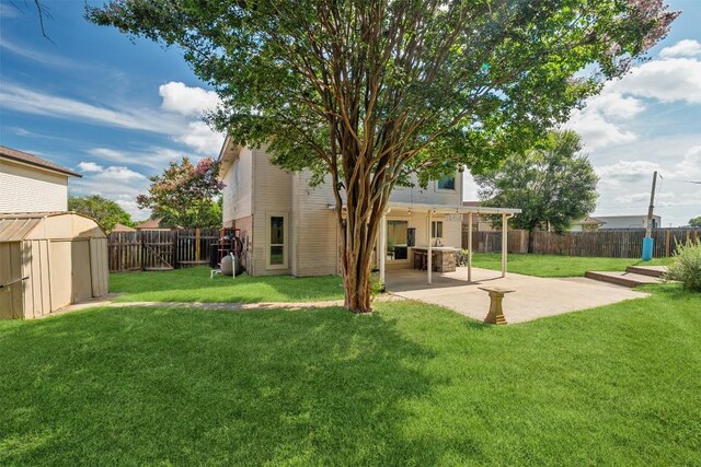 506 Turtle Back Cv, Killeen, TX 76542 - rear view of house with a patio, a storage shed, and a fenced backyard
