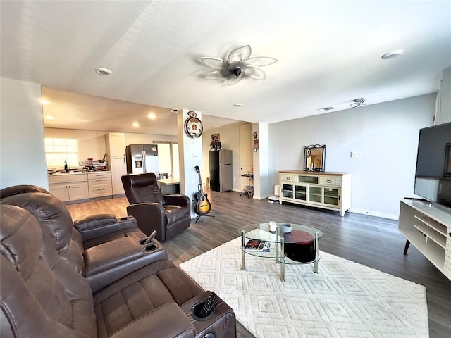 149 Gato Rd, Cedar Creek, TX 78612 - living area with a ceiling fan, wood finished floors, and recessed lighting
