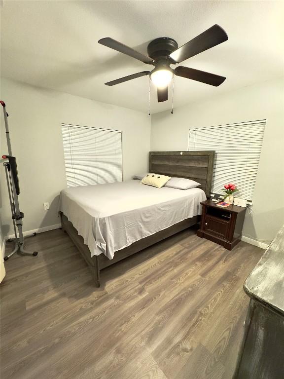 149 Gato Rd, Cedar Creek, TX 78612 - bedroom featuring wood finished floors and ceiling fan