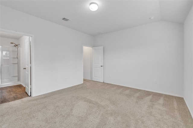 14802 Tuff Rd, Manor, TX 78653 - spare room featuring carpet floors and lofted ceiling