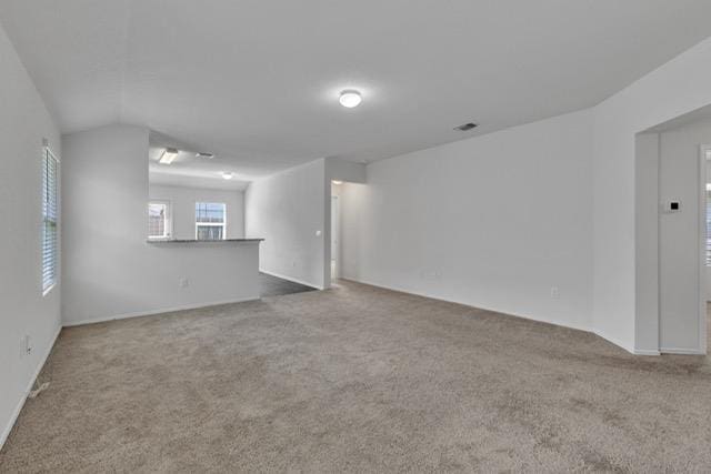 14802 Tuff Rd, Manor, TX 78653 - unfurnished living room with carpet floors and baseboards