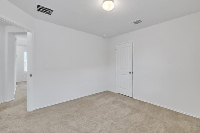 14802 Tuff Rd, Manor, TX 78653 - spare room with light carpet and baseboards