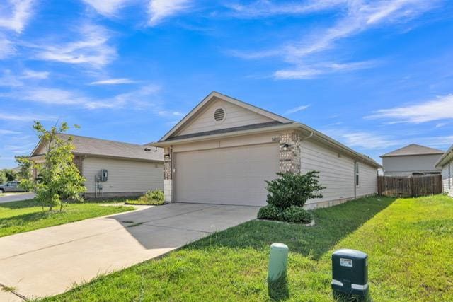 14802 Tuff Rd, Manor, TX 78653 - view of front of house with driveway and a garage