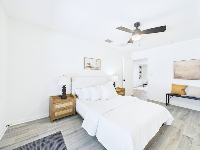 6108 Shadow Valley Dr Unit B, Austin, TX 78731 - bedroom with light wood finished floors and ceiling fan