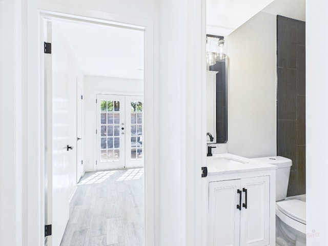 6108 Shadow Valley Dr Unit B, Austin, TX 78731 - bathroom featuring vanity, wood finished floors, and french doors