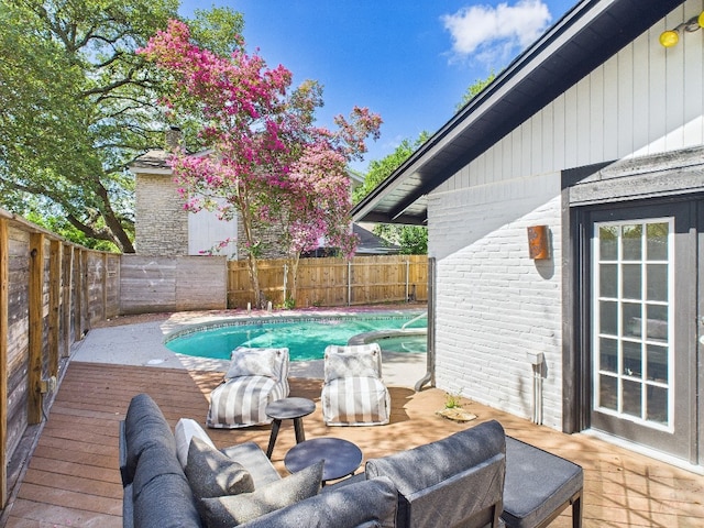 6108 Shadow Valley Dr Unit B, Austin, TX 78731 - view of pool with a fenced backyard, a wooden deck, and a pool with connected hot tub