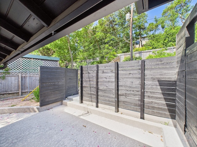 6108 Shadow Valley Dr Unit B, Austin, TX 78731 - fenced backyard featuring a patio