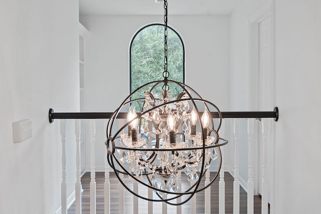 9402 Caracas Dr, Austin, TX 78733 - detailed view of a chandelier and wood finished floors