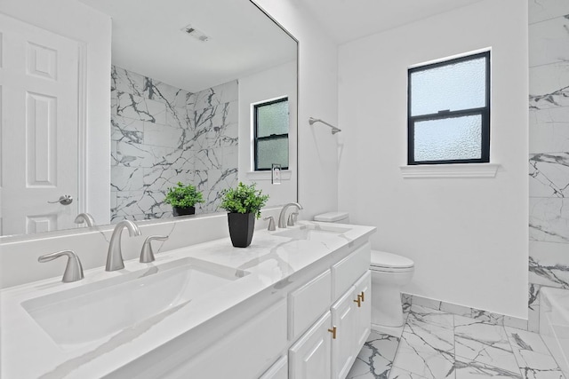 9402 Caracas Dr, Austin, TX 78733 - bathroom featuring marble look tiles, double vanity, and a marble finish shower