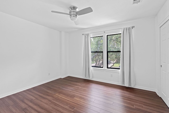 9402 Caracas Dr, Austin, TX 78733 - unfurnished room with dark wood-style floors and a ceiling fan