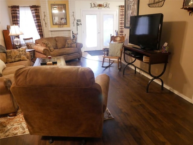 1501 W Braker Ln Unit 1262B, Austin, TX 78758 - living room with plenty of natural light and dark wood-style floors