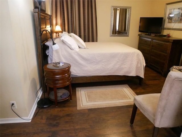 1501 W Braker Ln Unit 1262B, Austin, TX 78758 - bedroom featuring dark wood-type flooring
