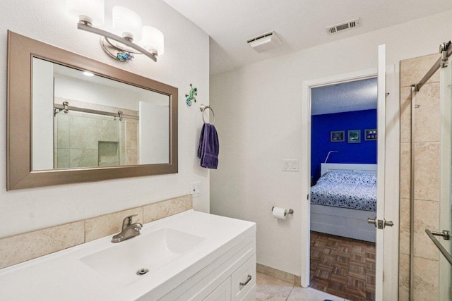 428 Gotier Trace Rd, Smithville, TX 78957 - ensuite bathroom featuring a stall shower and vanity