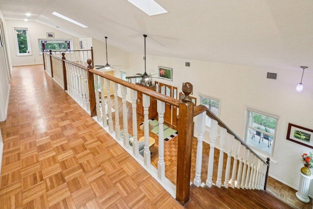 428 Gotier Trace Rd, Smithville, TX 78957 - stairs with lofted ceiling, a skylight, and ceiling fan