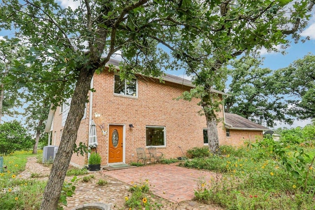 428 Gotier Trace Rd, Smithville, TX 78957 - view of front of home featuring a patio area and brick siding