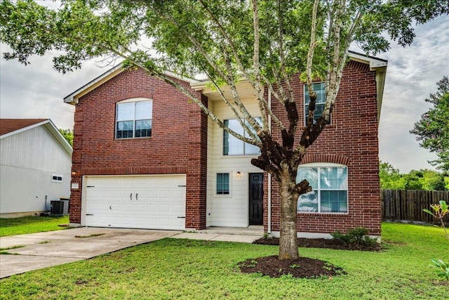 618 Lavaca Loop, Elgin, TX 78621 - view of front of property featuring an attached garage, driveway, and brick siding