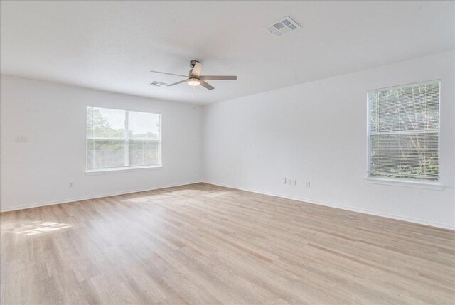 618 Lavaca Loop, Elgin, TX 78621 - spare room featuring ceiling fan and light wood finished floors