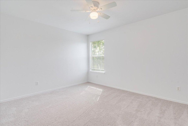 618 Lavaca Loop, Elgin, TX 78621 - carpeted empty room with a ceiling fan and baseboards