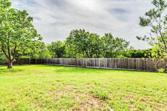 618 Lavaca Loop, Elgin, TX 78621 - view of fenced backyard