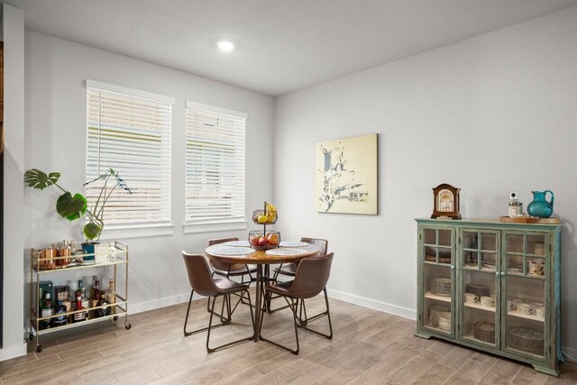 2705 Grizzly Way, Leander, TX 78641 - dining space with wood finished floors and recessed lighting