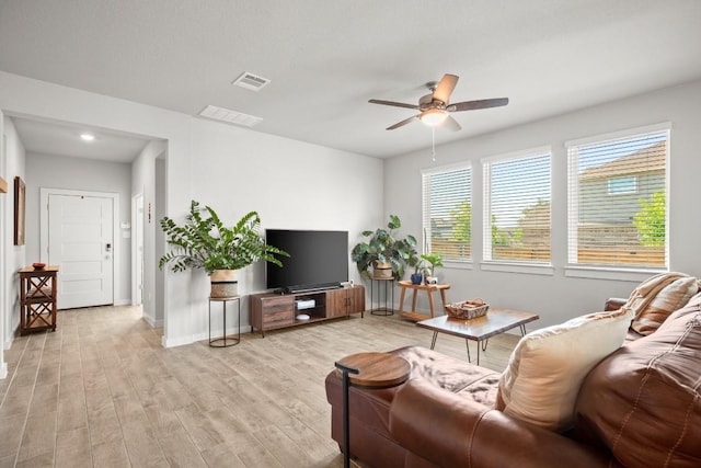 2705 Grizzly Way, Leander, TX 78641 - living area with a ceiling fan, light wood-style flooring, and recessed lighting