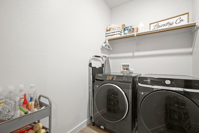 2705 Grizzly Way, Leander, TX 78641 - washroom with washer and clothes dryer and baseboards