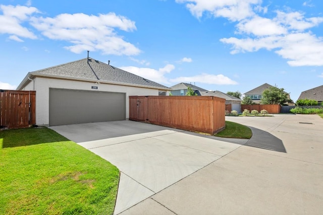 2705 Grizzly Way, Leander, TX 78641 - view of side of home featuring driveway and an attached garage