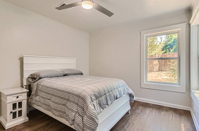 1202 Loma Dr, Austin, TX 78741 - bedroom featuring dark wood-style floors and ceiling fan