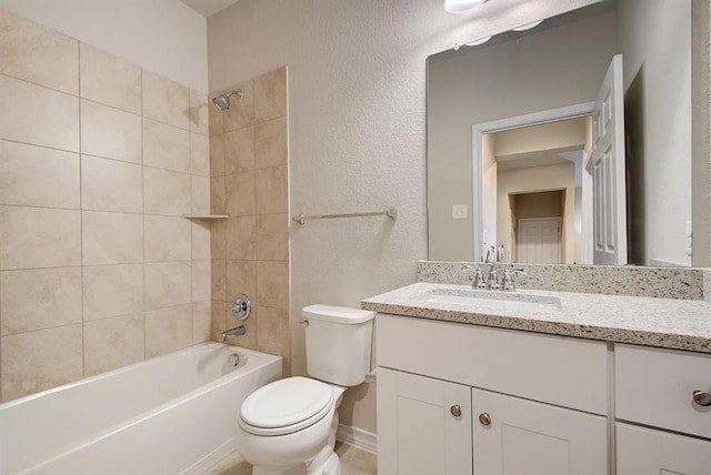 7634 Leonardo Dr, Round Rock, TX 78665 - full bathroom with vanity, bathing tub / shower combination, and a textured wall