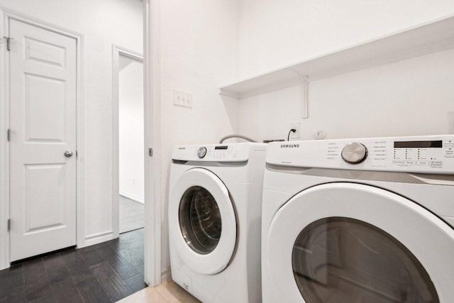 7634 Leonardo Dr, Round Rock, TX 78665 - laundry area with separate washer and dryer and dark wood finished floors