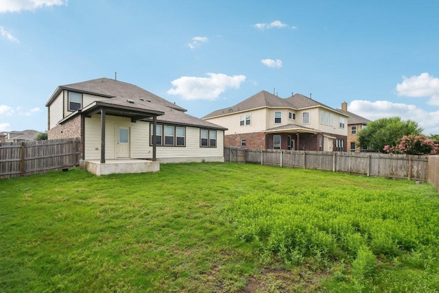 7634 Leonardo Dr, Round Rock, TX 78665 - rear view of house featuring a patio and a fenced backyard