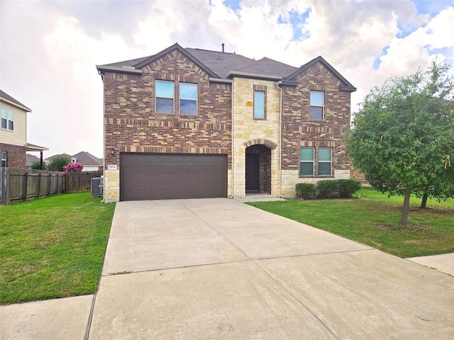 7634 Leonardo Dr, Round Rock, TX 78665 - view of front of home with a garage, driveway, stone siding, and brick siding