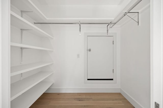 1911 Piedmont Ave, Austin, TX 78757 - spacious closet featuring light wood-style floors