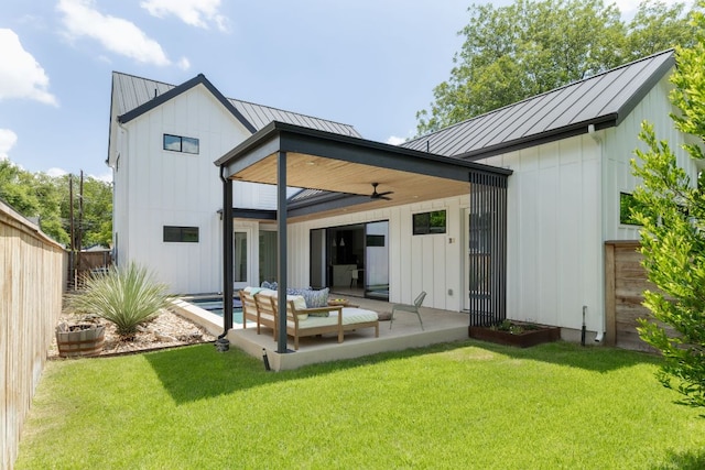 1911 Piedmont Ave, Austin, TX 78757 - rear view of property with a standing seam roof, board and batten siding, ceiling fan, and a metal roof
