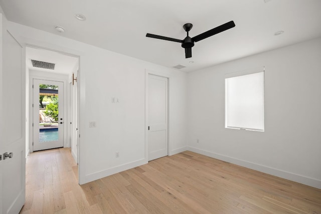 1911 Piedmont Ave, Austin, TX 78757 - unfurnished bedroom featuring light wood-type flooring and ceiling fan
