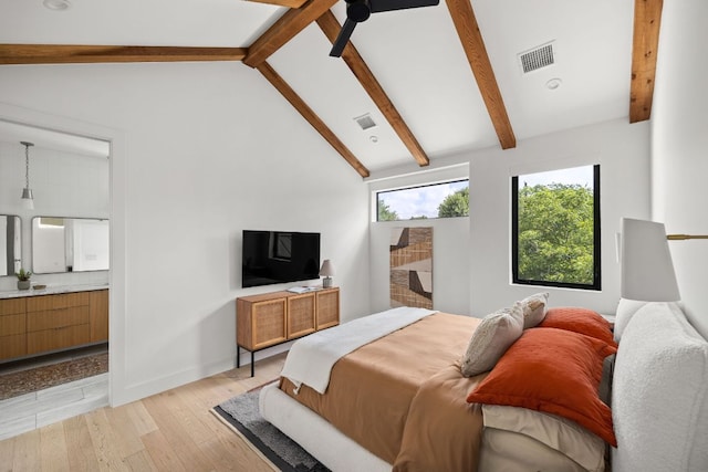 1911 Piedmont Ave, Austin, TX 78757 - bedroom featuring light wood-type flooring and ensuite bathroom