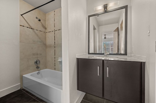 1101 Grove Blvd Unit 206, Austin, TX 78741 - full bathroom with tile patterned flooring, vanity, tub / shower combination, and a textured wall