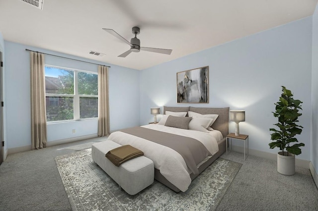 1101 Grove Blvd Unit 206, Austin, TX 78741 - carpeted bedroom with a ceiling fan and baseboards