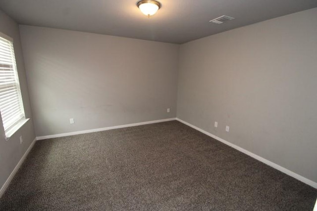 861 Stockdale Rd, Copperas Cove, TX 76522 - unfurnished room featuring plenty of natural light and dark colored carpet
