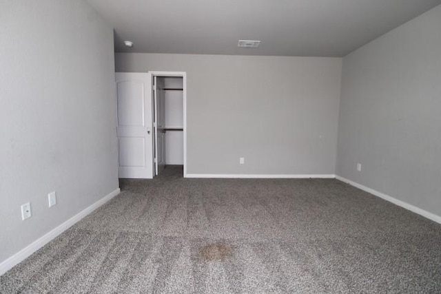 861 Stockdale Rd, Copperas Cove, TX 76522 - unfurnished bedroom with carpet, a walk in closet, and a closet