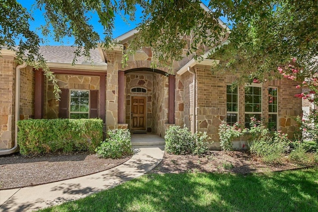 2944 Saint Federico Way, Round Rock, TX 78665 - doorway to property featuring stone siding and brick siding