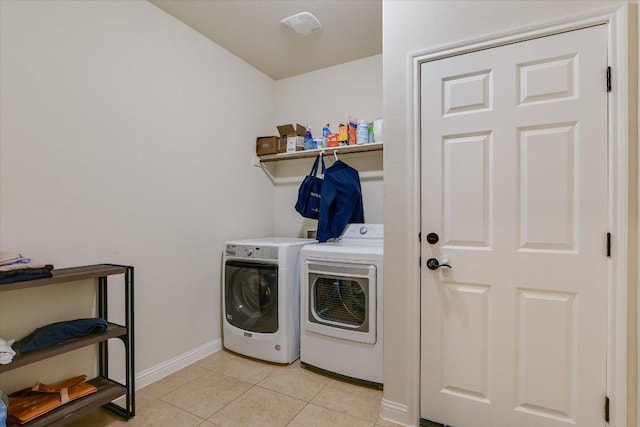 2944 Saint Federico Way, Round Rock, TX 78665 - laundry area with washing machine and dryer and light tile patterned floors