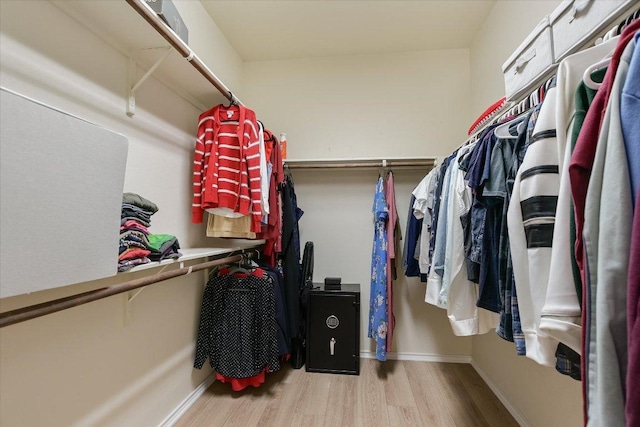 2944 Saint Federico Way, Round Rock, TX 78665 - walk in closet featuring wood finished floors