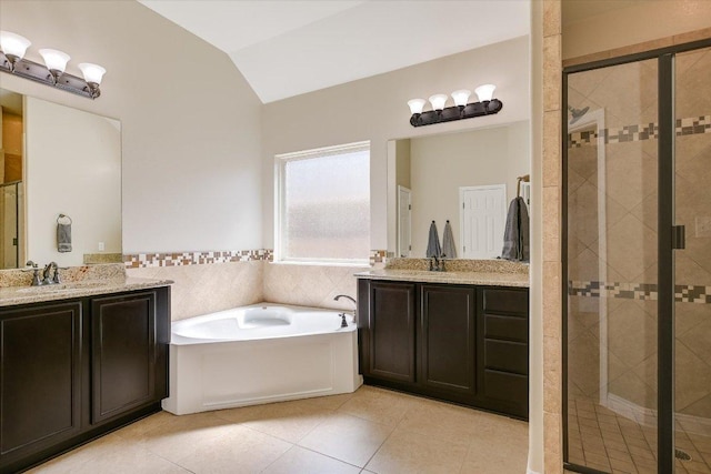 2944 Saint Federico Way, Round Rock, TX 78665 - full bath featuring a bath, a shower stall, tile patterned floors, and vaulted ceiling